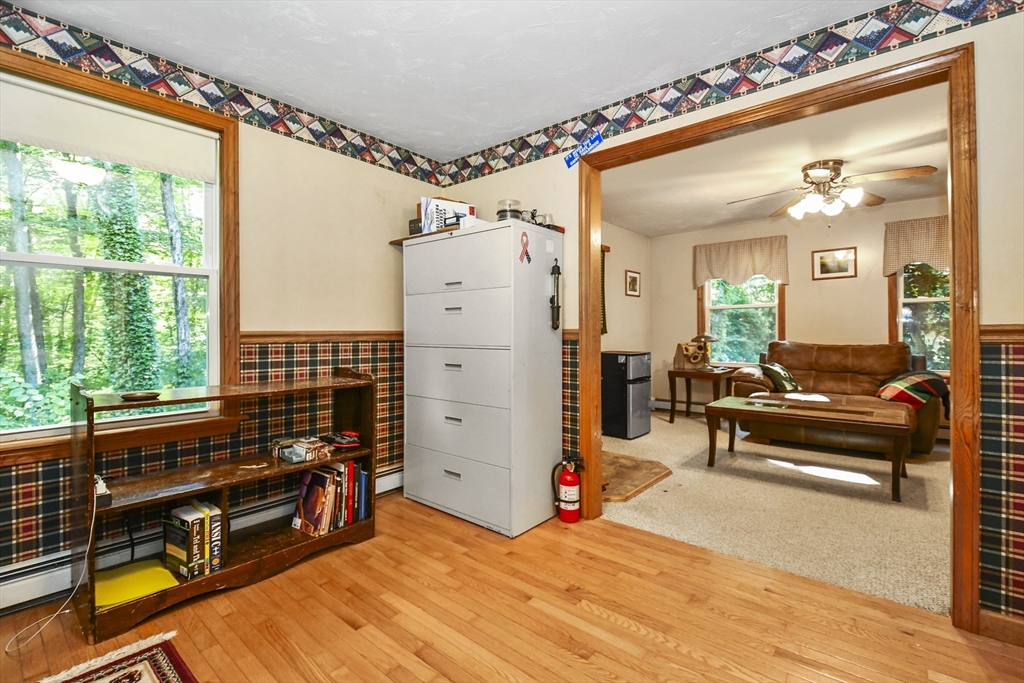 549 Chestnut Hill Road Millville, MA 01529 - Photo 15 of 38 a bedroom with furniture and a window