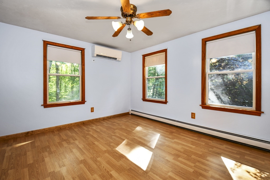 549 Chestnut Hill Road Millville, MA 01529 - Photo 19 of 38 a view of an empty room with a window