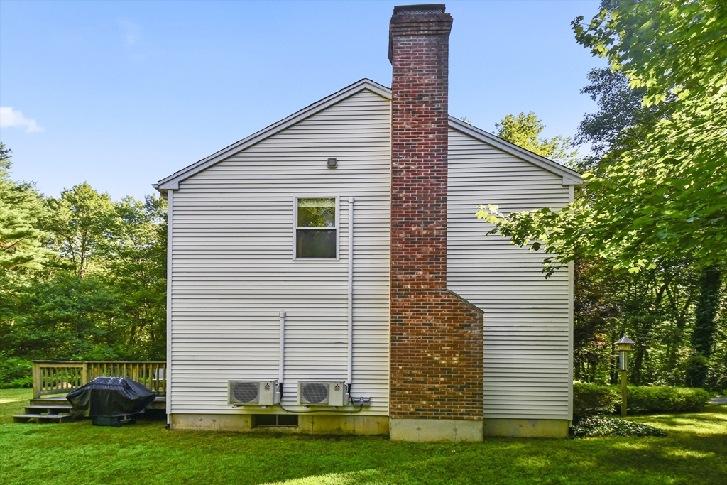 549 Chestnut Hill Road Millville, MA 01529 - Photo 24 of 38 a view of a house with backyard