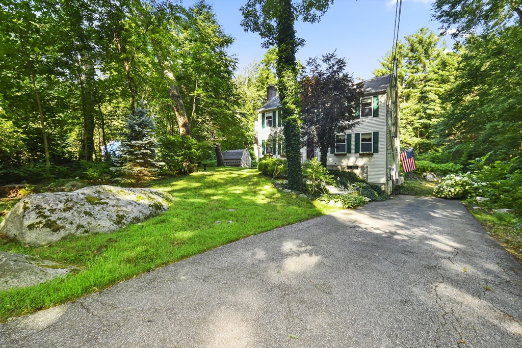 549 Chestnut Hill Road Millville, MA 01529 - Photo 31 of 38 a view of a garden with a house