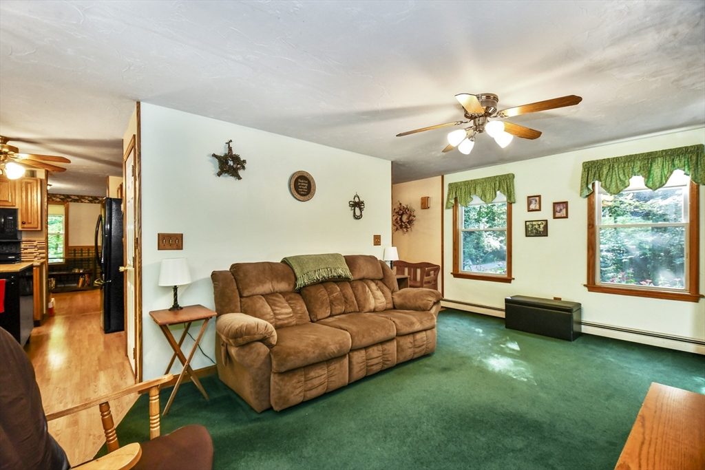 549 Chestnut Hill Road Millville, MA 01529 - Photo 7 of 38 a living room with furniture and a large window