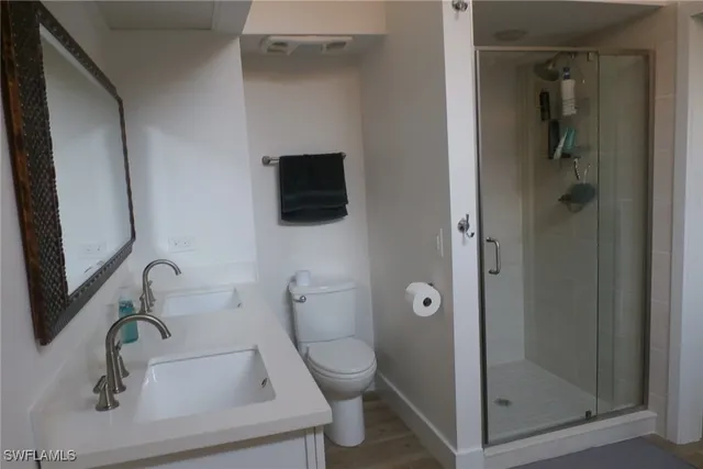 a bathroom with a toilet and a sink