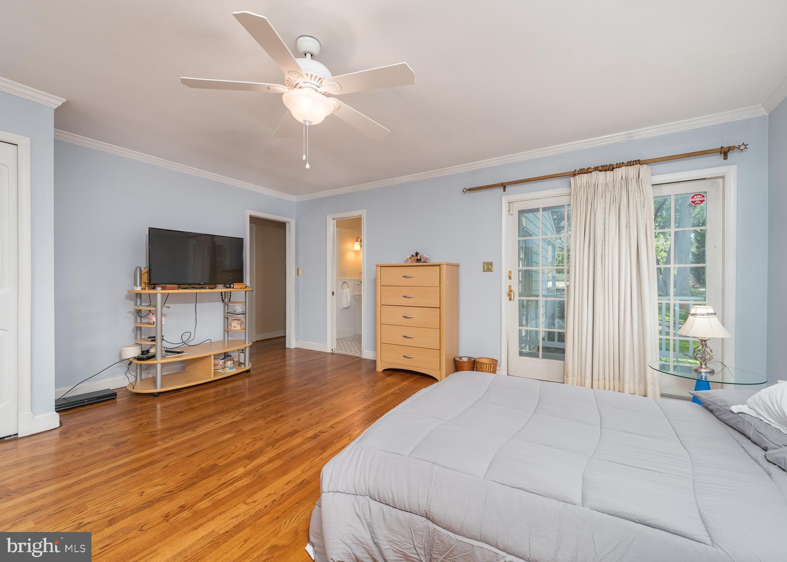 211 Patuxent Road Laurel, MD 20707 - Photo 19 of 46 Main level primary bedroom view 2 with porch