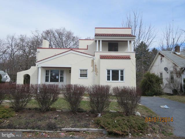 6220 Liberty Road Baltimore, MD 21207 - Photo 1 of 9 a front view of a house with garden