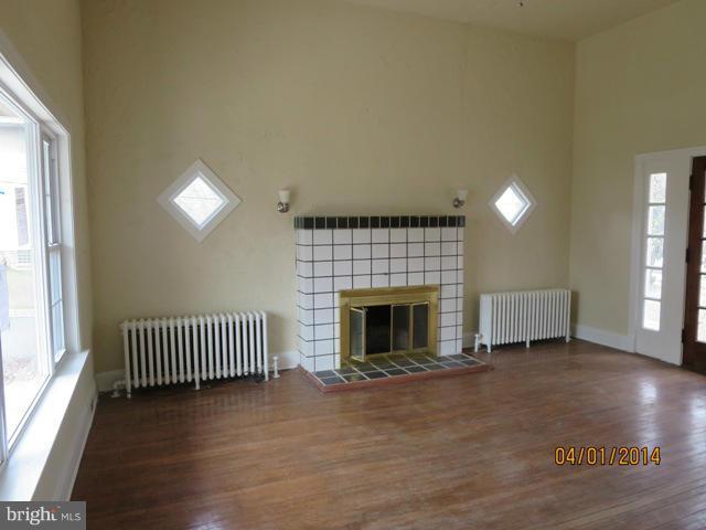 6220 Liberty Road Baltimore, MD 21207 - Photo 2 of 9 an entryway and livingroom with furniture