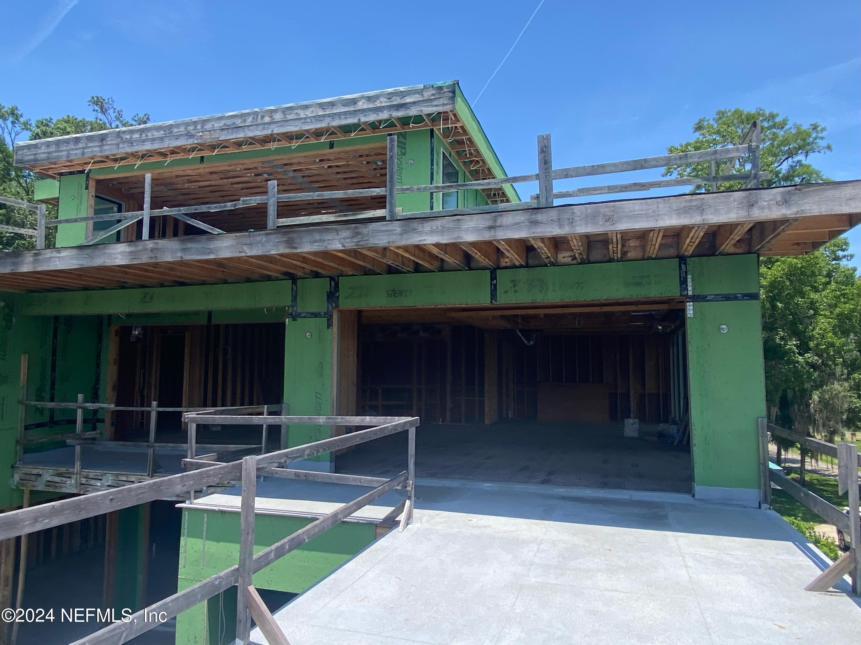 31 Cat Road Ponte Vedra Beach, FL 32082 - Photo 5 of 8 a front view of a house with a porch