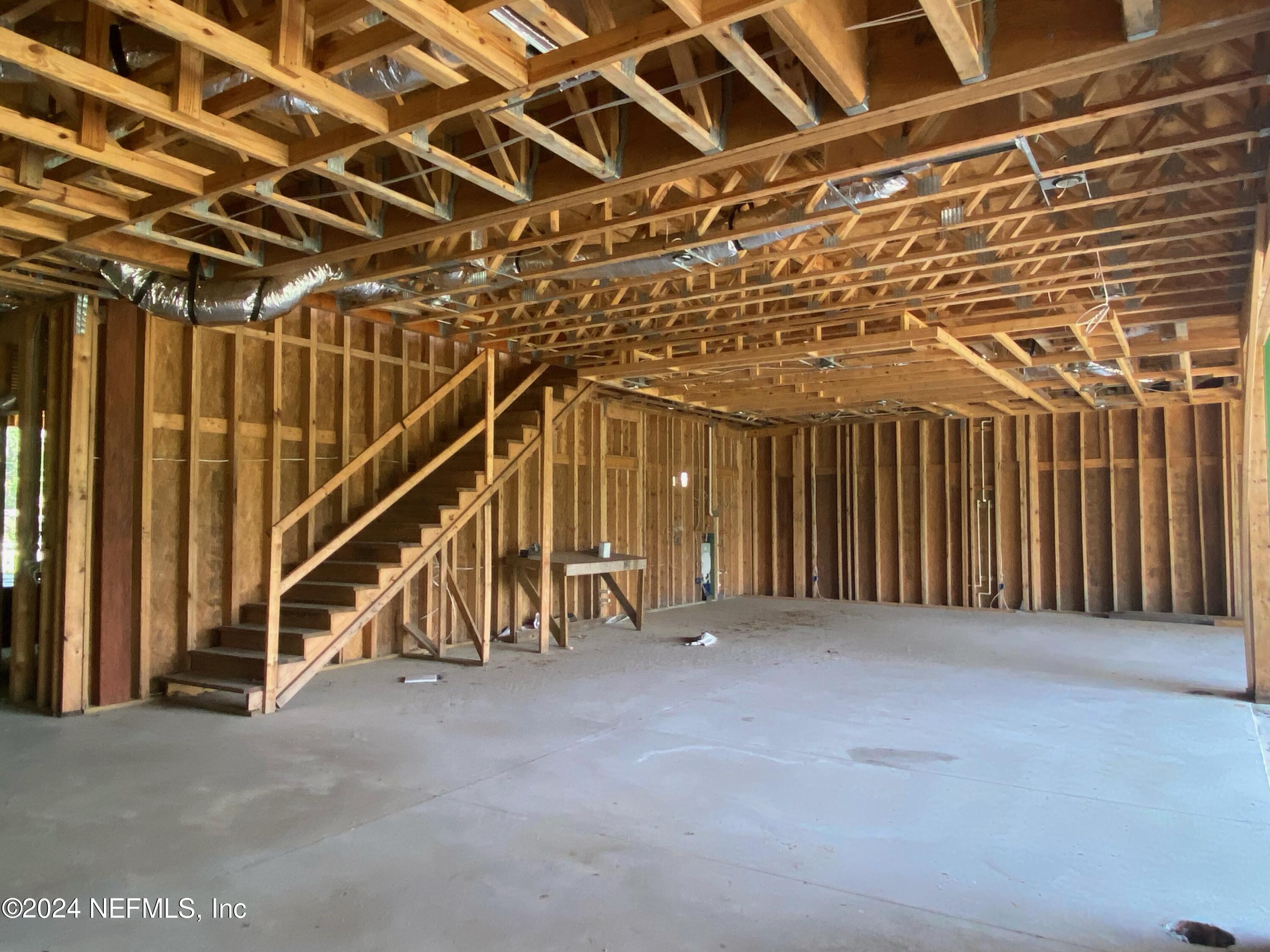 31 Cat Road Ponte Vedra Beach, FL 32082 - Photo 6 of 8 a view of an empty room with stairs