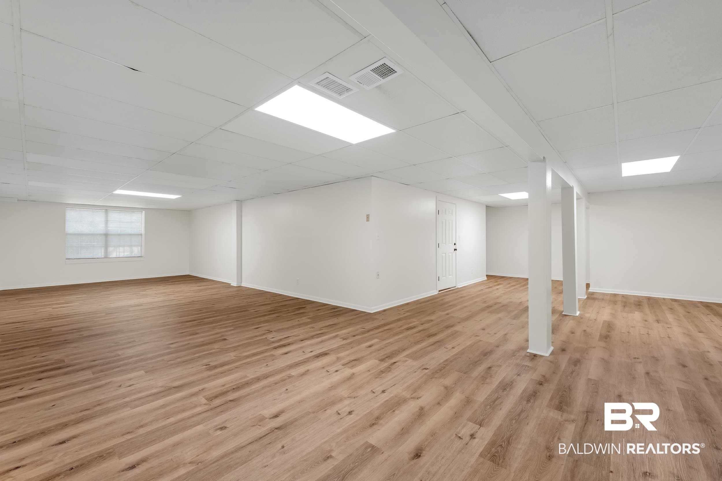 2 Navy Lane Daphne, AL 36527 - Photo 27 of 28 Basement with light wood-style floors and a drop ceiling