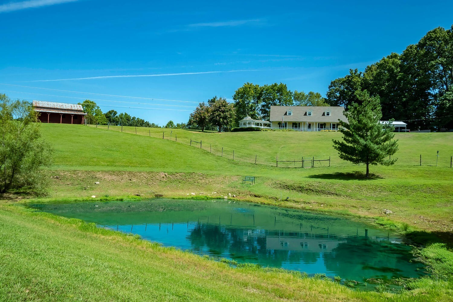 1345 Cowan Road Dickson, TN 37055 - Photo 6 of 68 a view of a garden with a building in the background