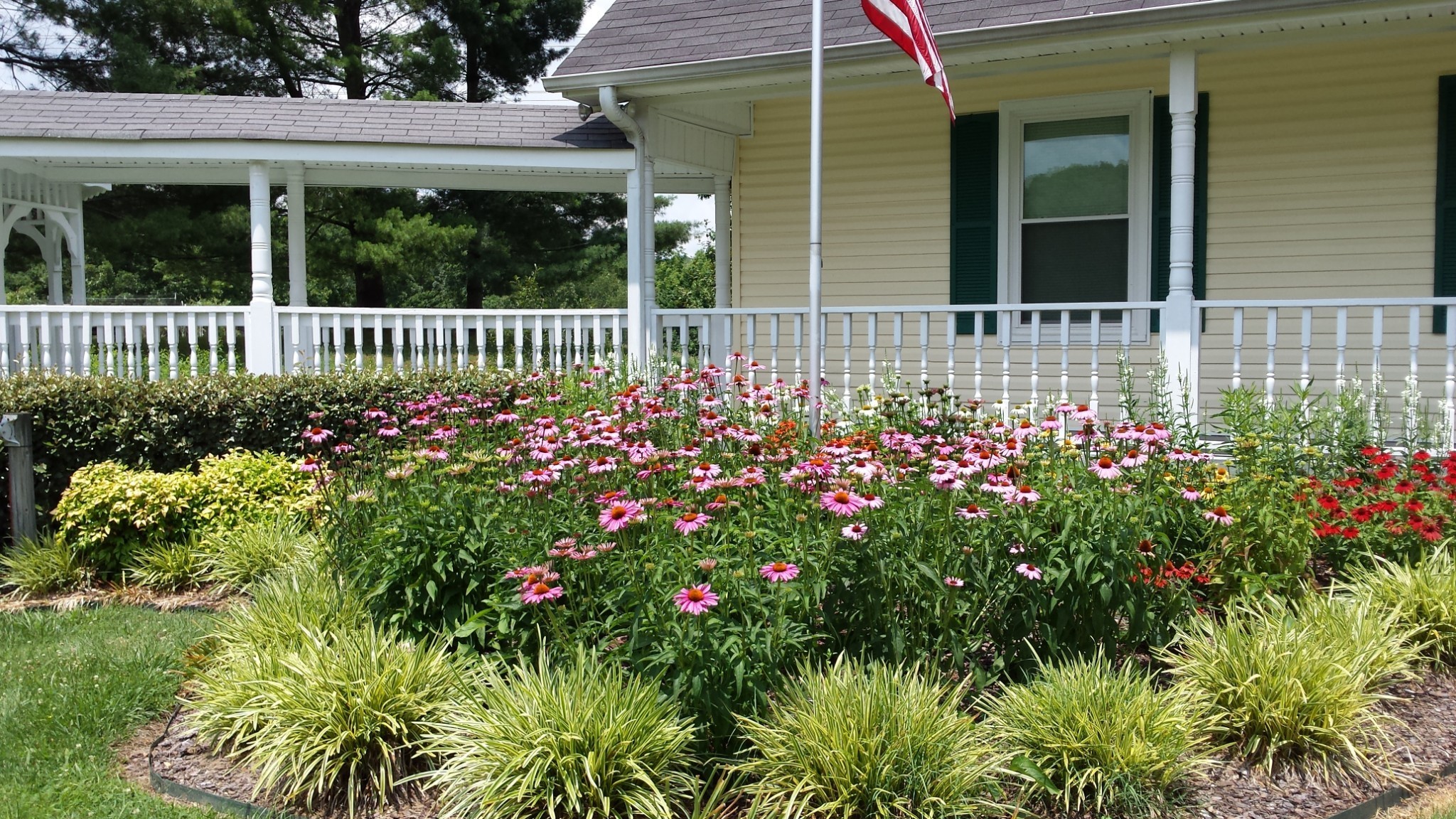 1345 Cowan Road Dickson, TN 37055 - Photo 64 of 68 a view of a house with a flower garden