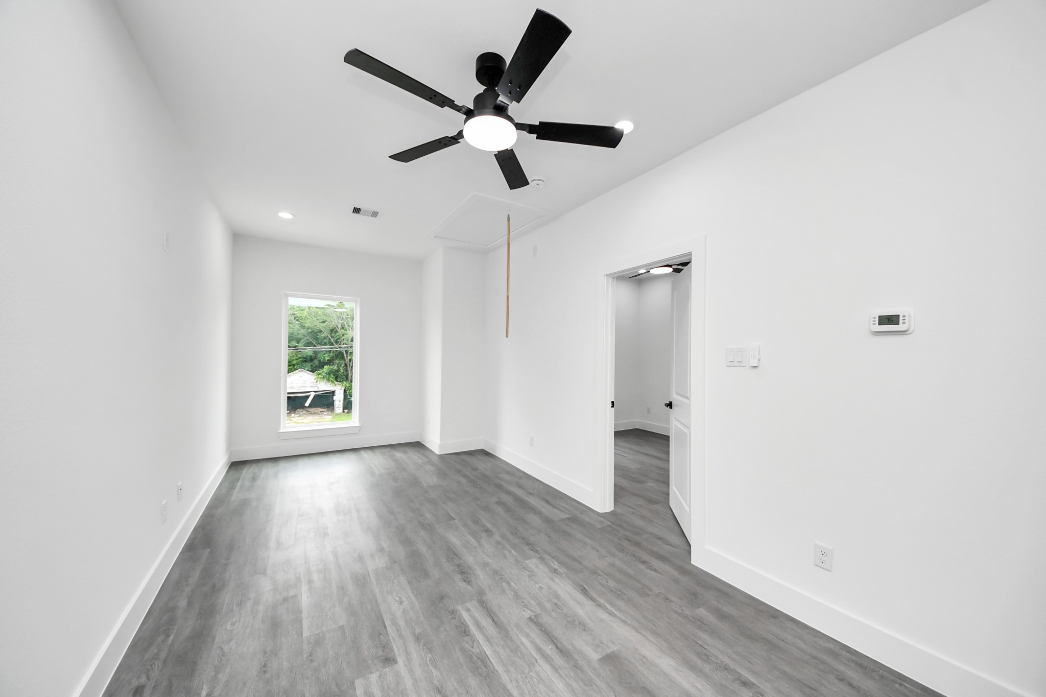 6629 Foster Street Houston, TX 77021 - Photo 18 of 33 Versatile upstairs loft area overlooking the living room, perfect for a game room, office, or additional lounge space.