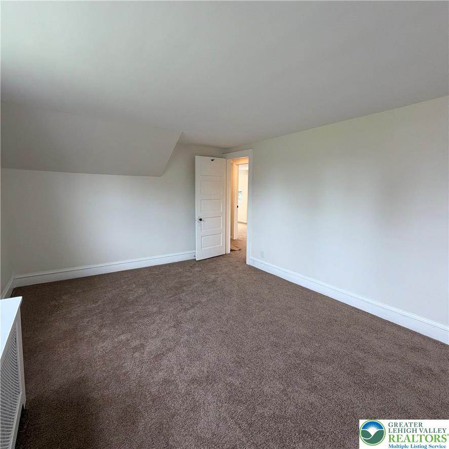 5111 Vera Cruz Road Emmaus, PA 18049 - Photo 34 of 44 Plush wall-to-wall carpeting and clean baseboards define this versatile upper-level space.