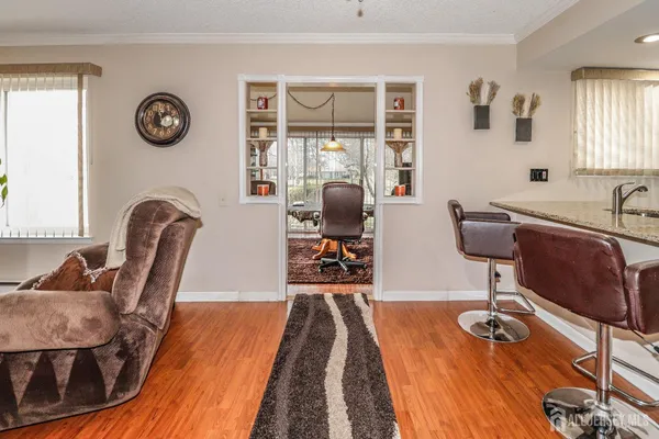 a living room with furniture and a table