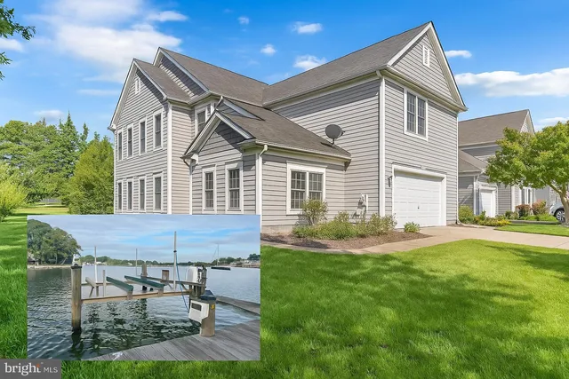 a front view of a house with a yard and porch