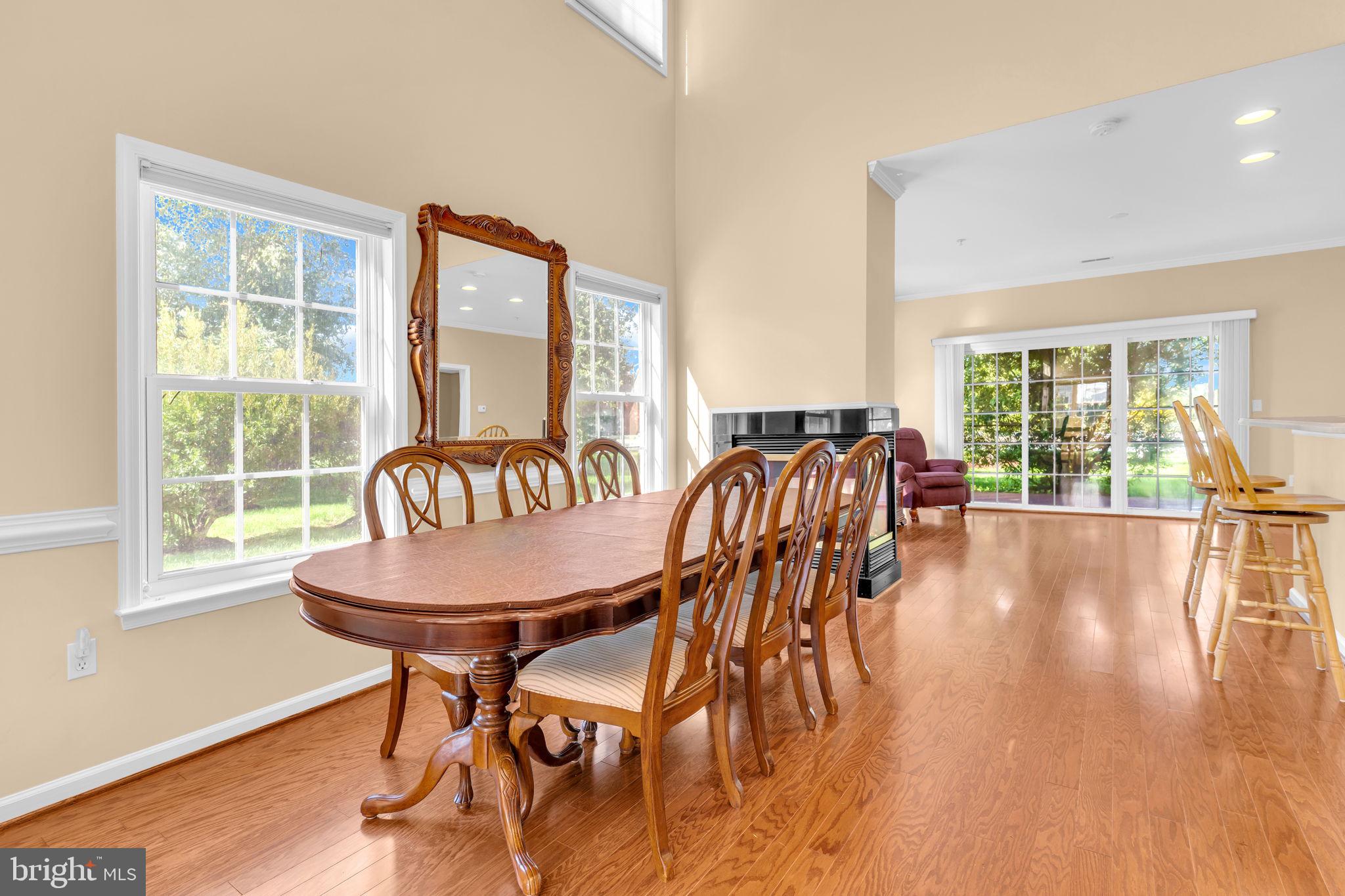 521 Marlboro Court, Unit 46 Solomons, MD 20629 - Photo 15 of 35 Main level dining open to family room