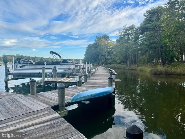 a view of a lake with sitting area
