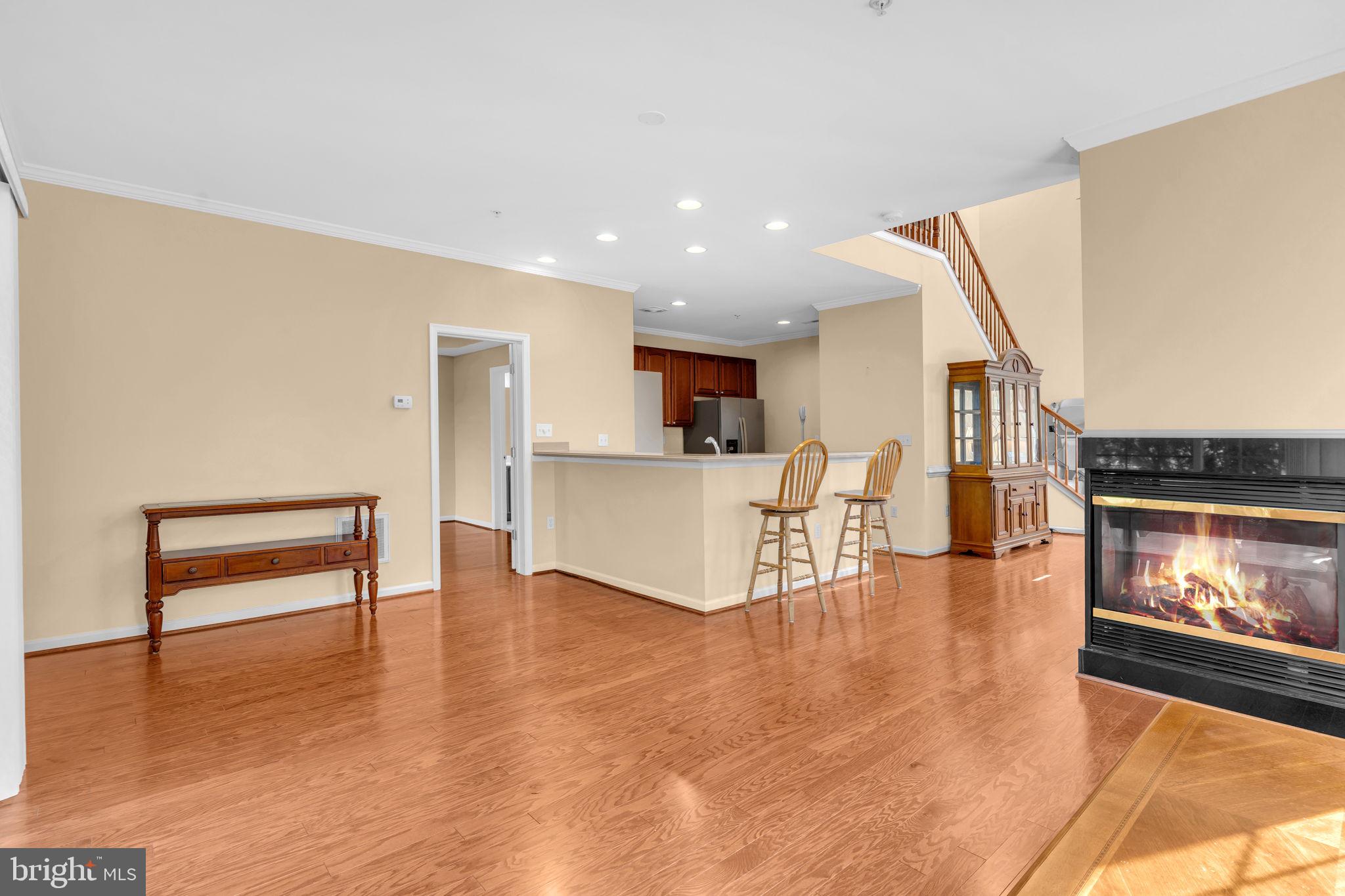 521 Marlboro Court, Unit 46 Solomons, MD 20629 - Photo 4 of 35 Family room with gas fireplace