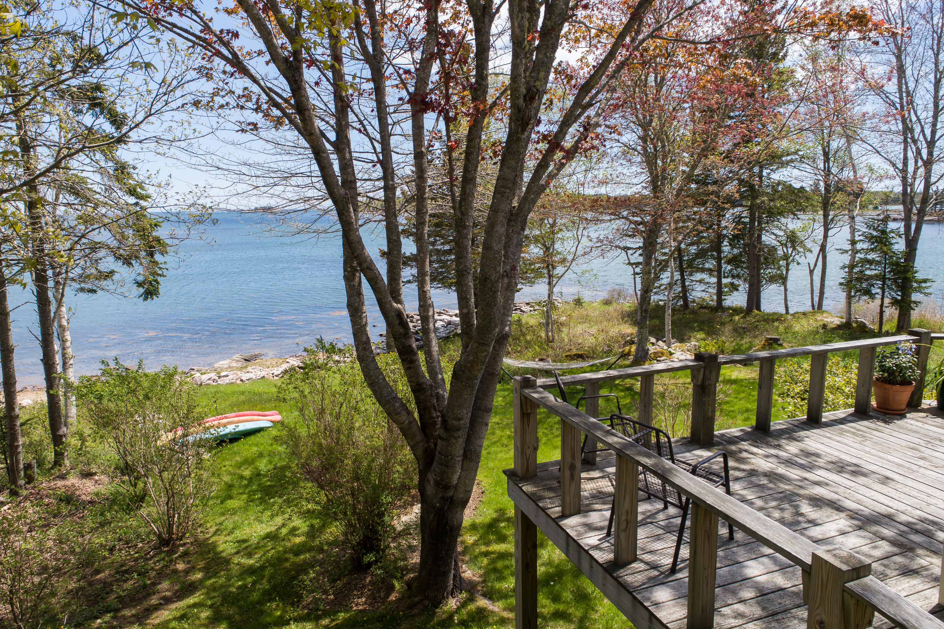 127 Paul Bunyan Road Corea, ME 04624 - Photo 5 of 46 From deck to lawn to beach to ocean.
