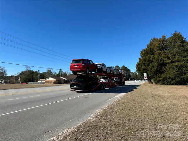 a view of swimming pool with sitting area