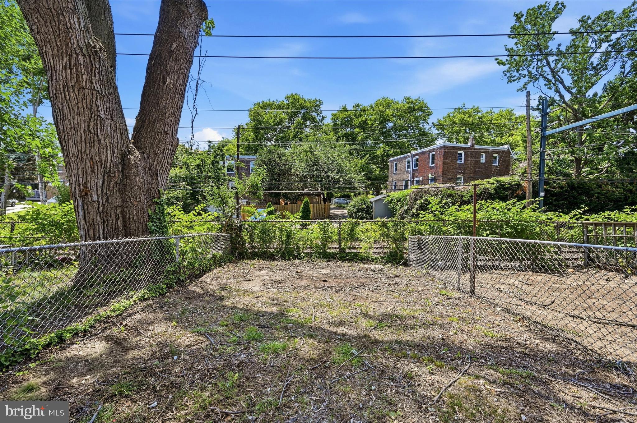 268 Blanchard Road Drexel Hill, PA 19026 - Photo 15 of 15 a view of a garden with a bench