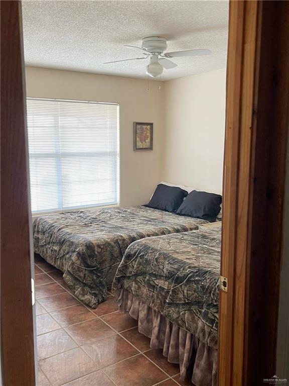 0 Loma Blanca Road Roma, TX 78584 - Photo 21 of 40 a bedroom with a bed and a window