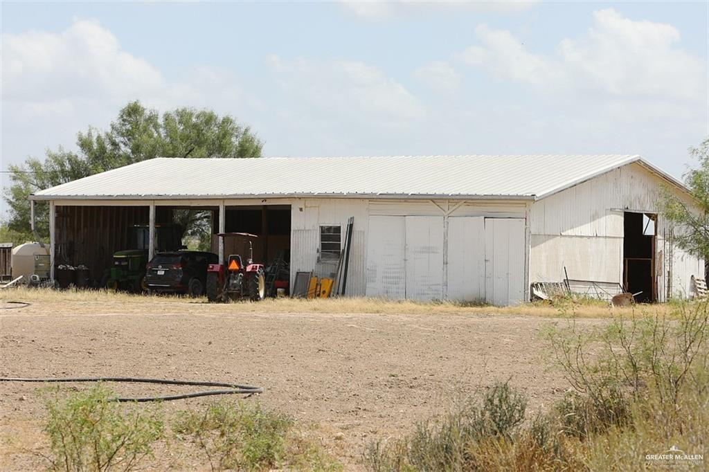 0 Loma Blanca Road Roma, TX 78584 - Photo 40 of 40 a front view of a house with a yard and garage