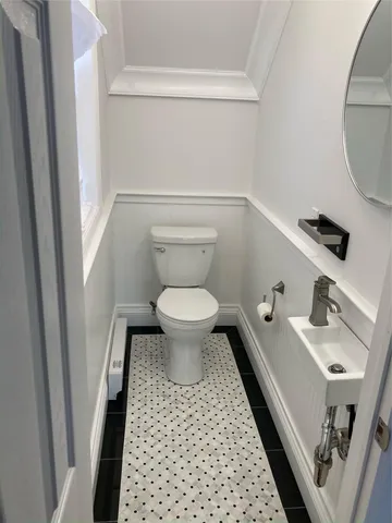 a bathroom with a sink and a toilet