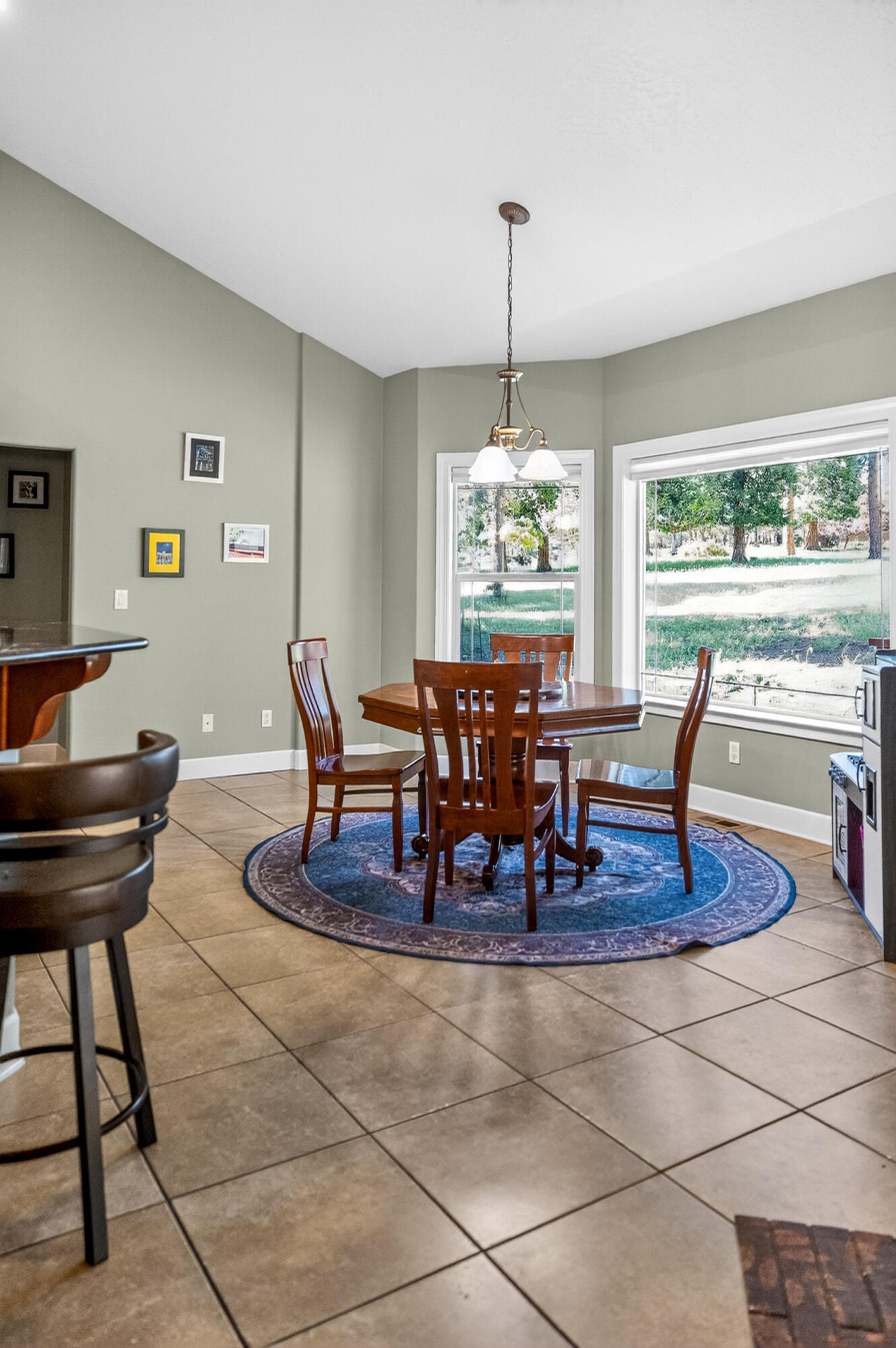 10421 Kestrel Road Klamath Falls, OR 97601 - Photo 24 of 56 a view of a dining room with furniture window and outside view