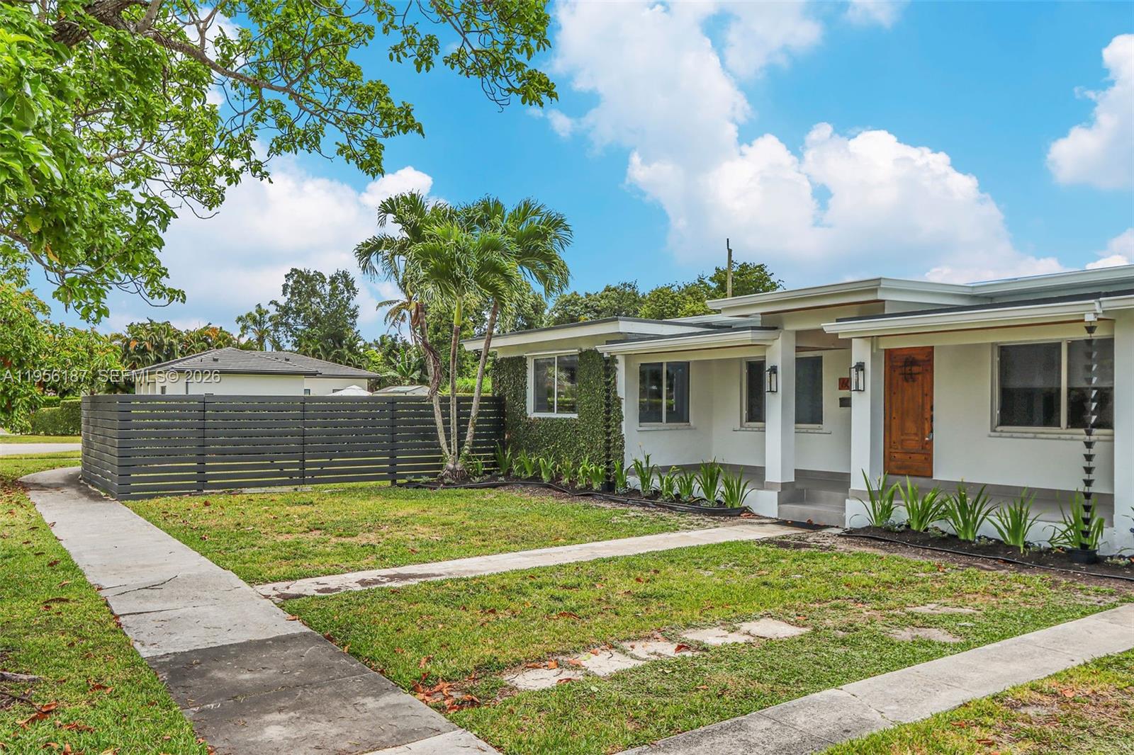 6050 Southwest 44th Terrace Miami, FL 33155 - Photo 6 of 18 a view of a house with a tub