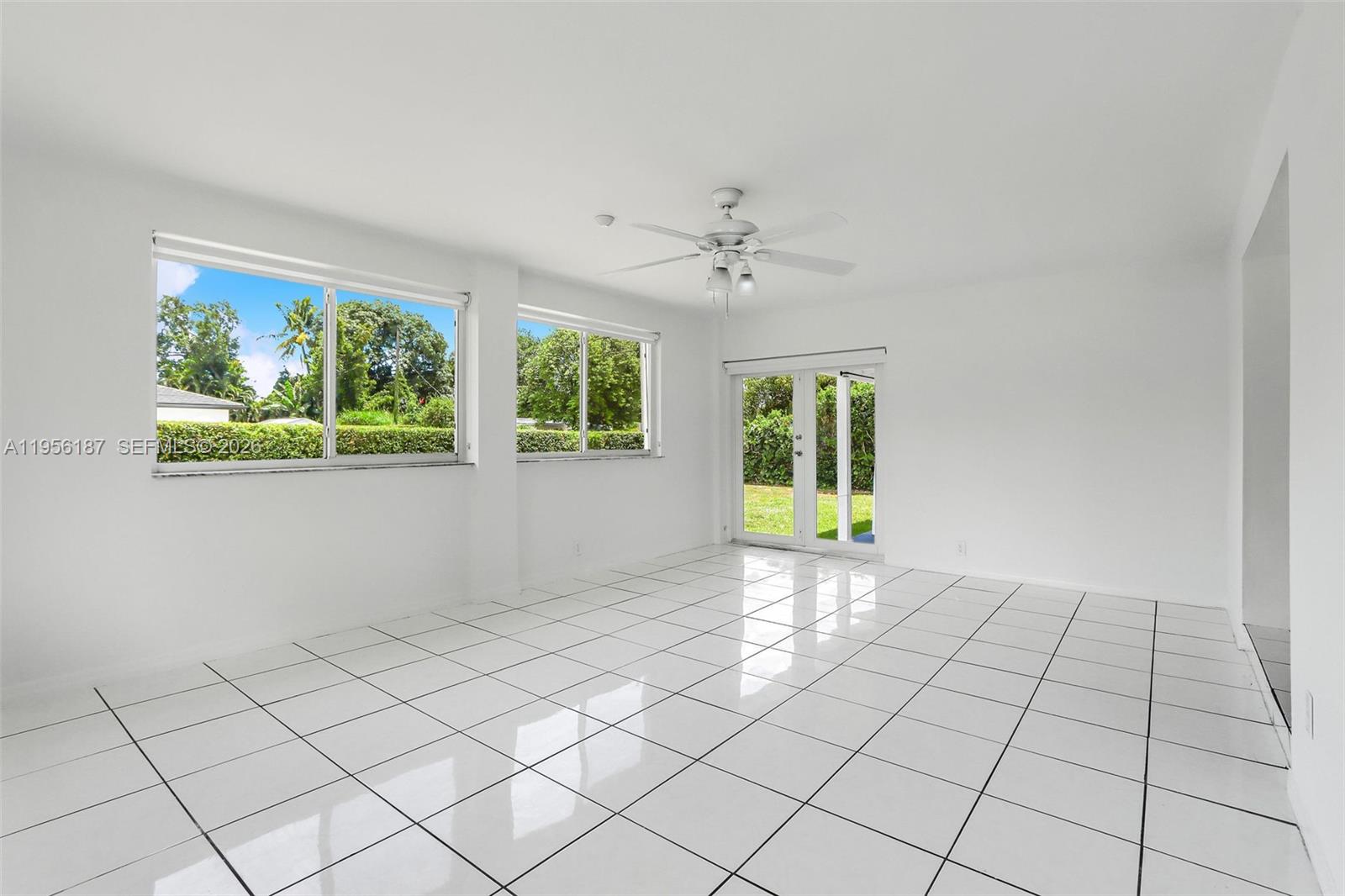 6050 Southwest 44th Terrace Miami, FL 33155 - Photo 10 of 18 a view of an empty room with a window