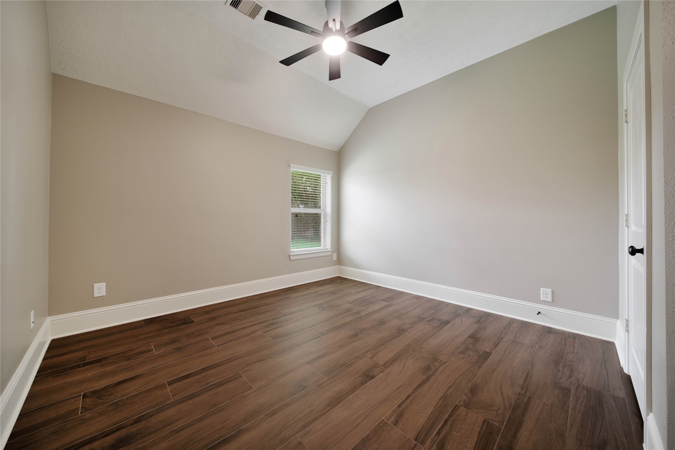 1215 Jake Springs Court Spring, TX 77386 - Photo 22 of 49 The secondary bedrooms are spacious and bright with generous closet space.