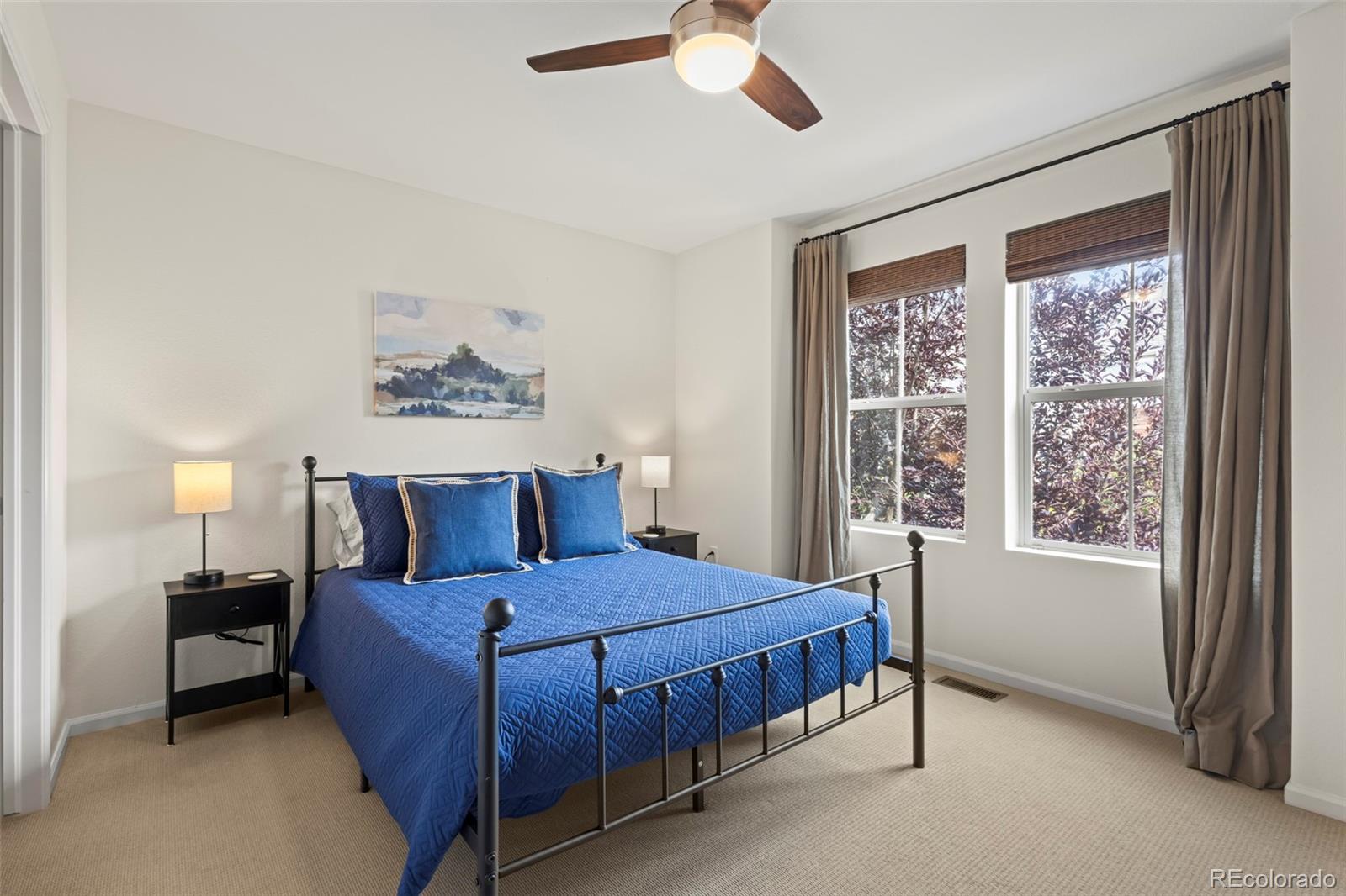 10281 Bellwether Lane Lone Tree, CO 80124 - Photo 18 of 47 a bedroom with a bed and a window
