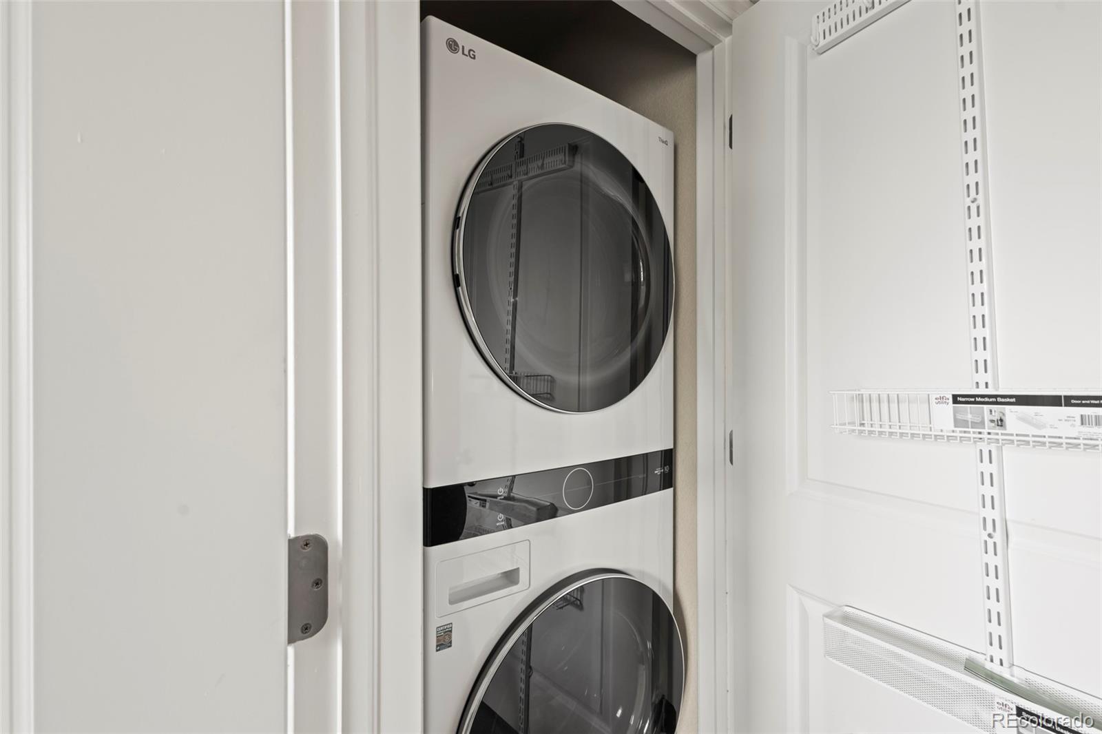 10281 Bellwether Lane Lone Tree, CO 80124 - Photo 30 of 47 a utility room with dryer and washer