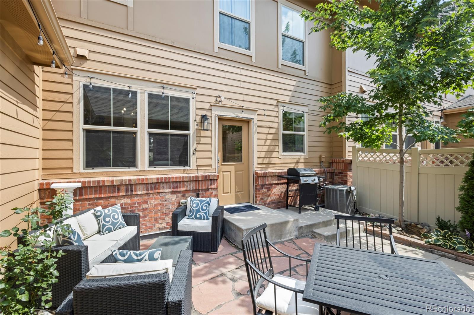 10281 Bellwether Lane Lone Tree, CO 80124 - Photo 33 of 47 a view of a patio with couple of chairs