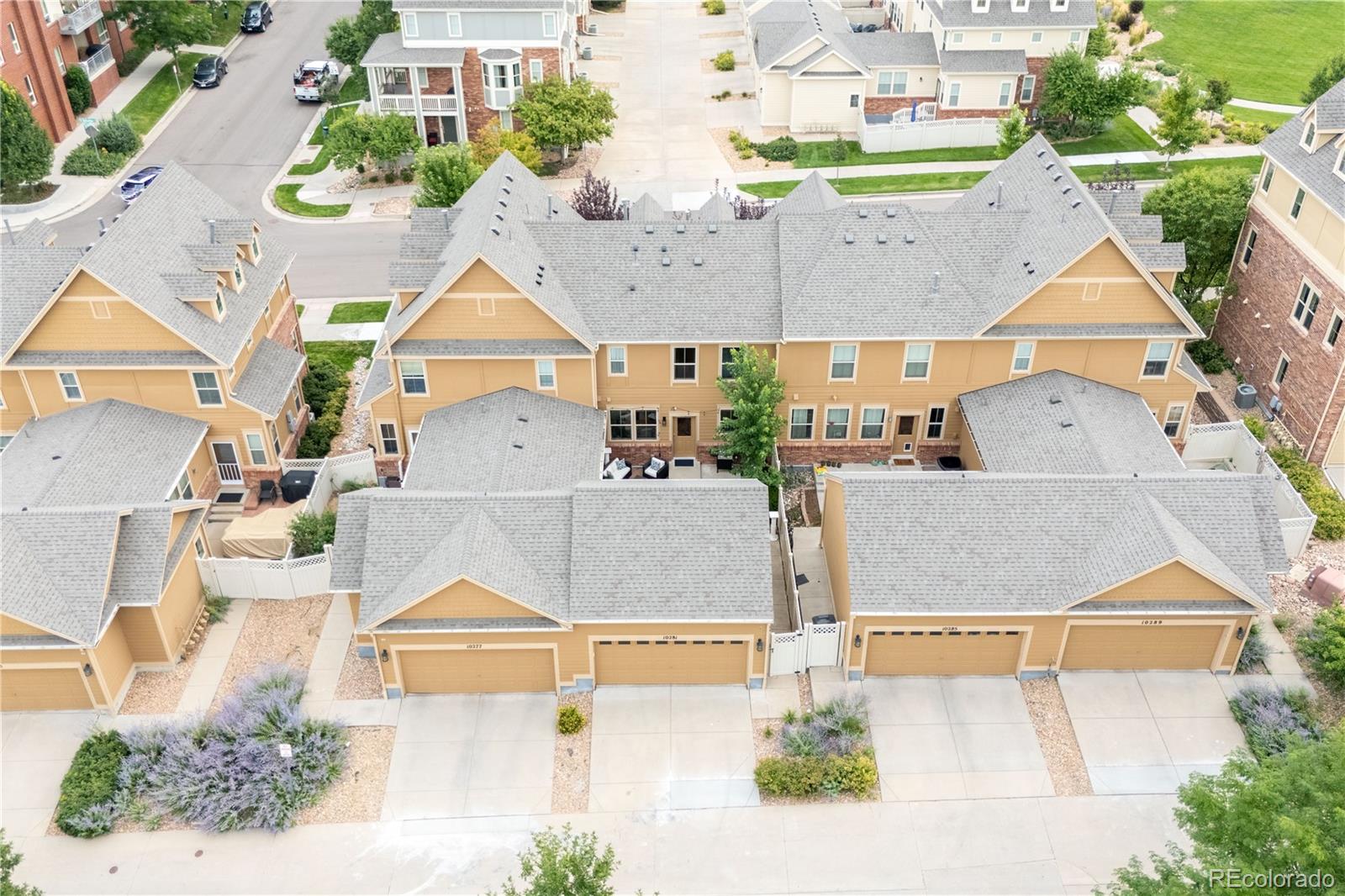 10281 Bellwether Lane Lone Tree, CO 80124 - Photo 41 of 47 an aerial view of a house with a yard and pool