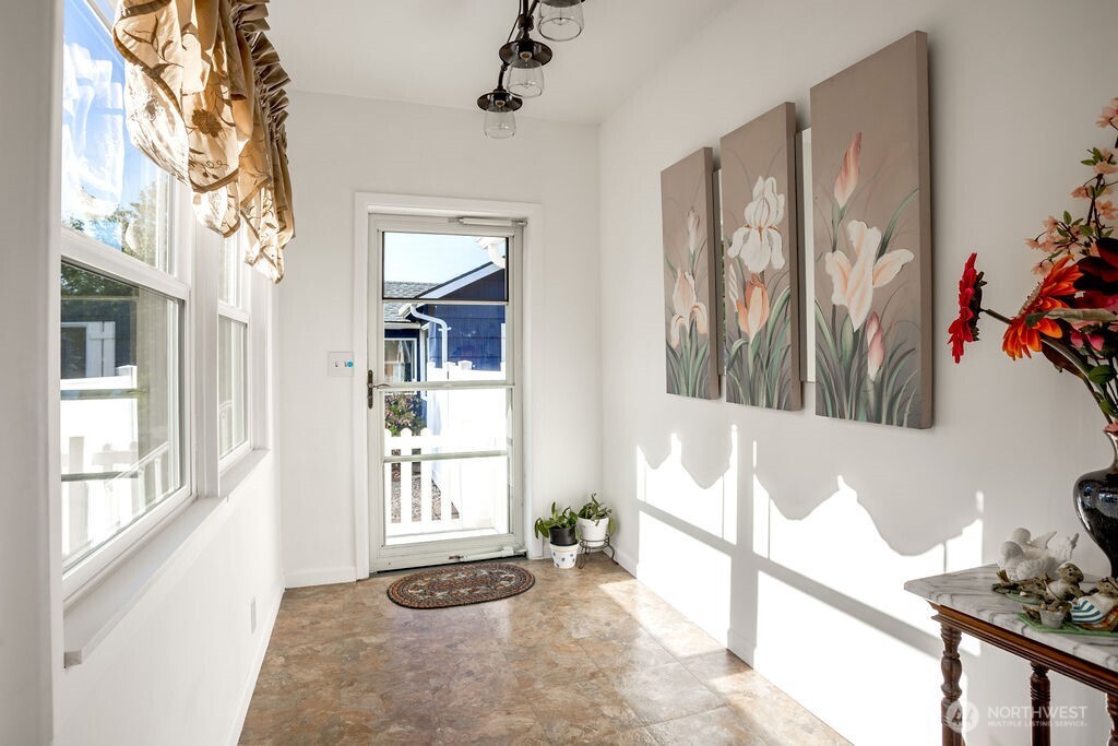 404 Jackson Street Ryderwood, WA 98581 - Photo 15 of 27 a view of an entryway with wooden floor and a livingroom