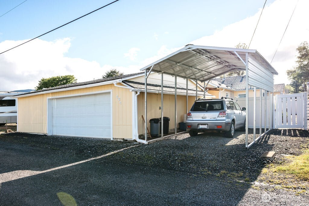 404 Jackson Street Ryderwood, WA 98581 - Photo 6 of 27 a view of a car park in front of house