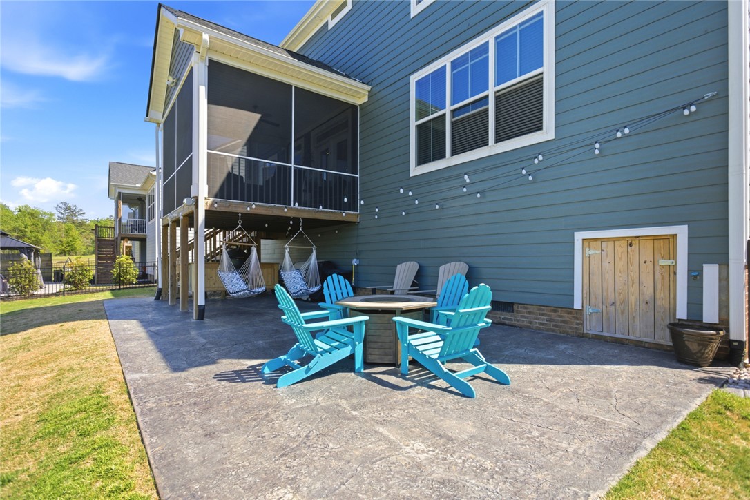318 Summerall Drive Anderson, SC 29621 - Photo 33 of 42 Enjoy outdoor living with a spacious screened porch and lower-level patio.