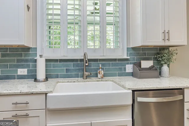 a view of a kitchen from the hallway