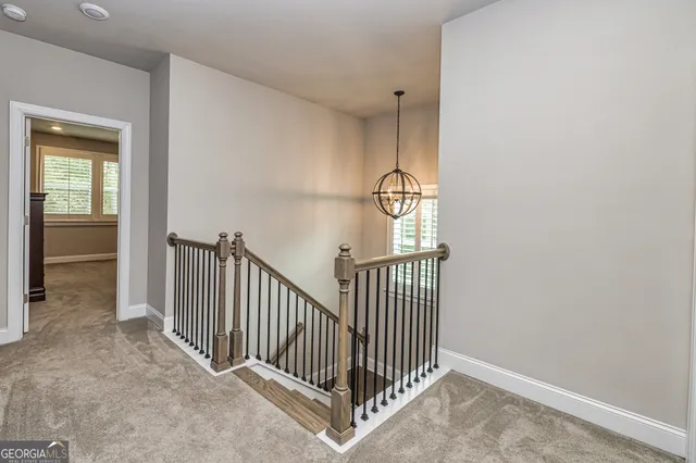 a bed room with a bed and a window