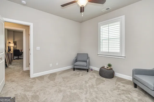 a utility room with granite countertop a sink a stove a washer and dryer