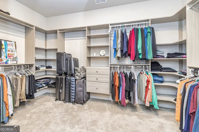 a view of swimming pool with seating space
