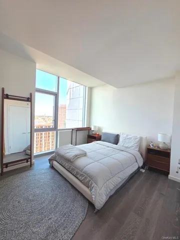 a bathroom with a double vanity sink mirror double and shower