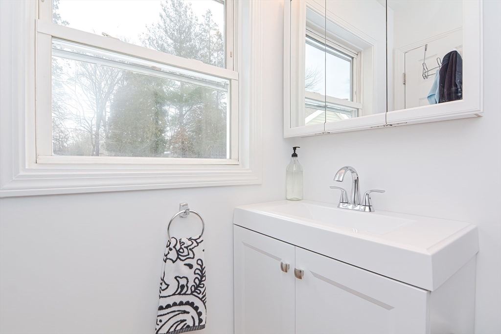 257 Brook Circle Hanover, MA 02339 - Photo 15 of 23 a bathroom with a sink and a window