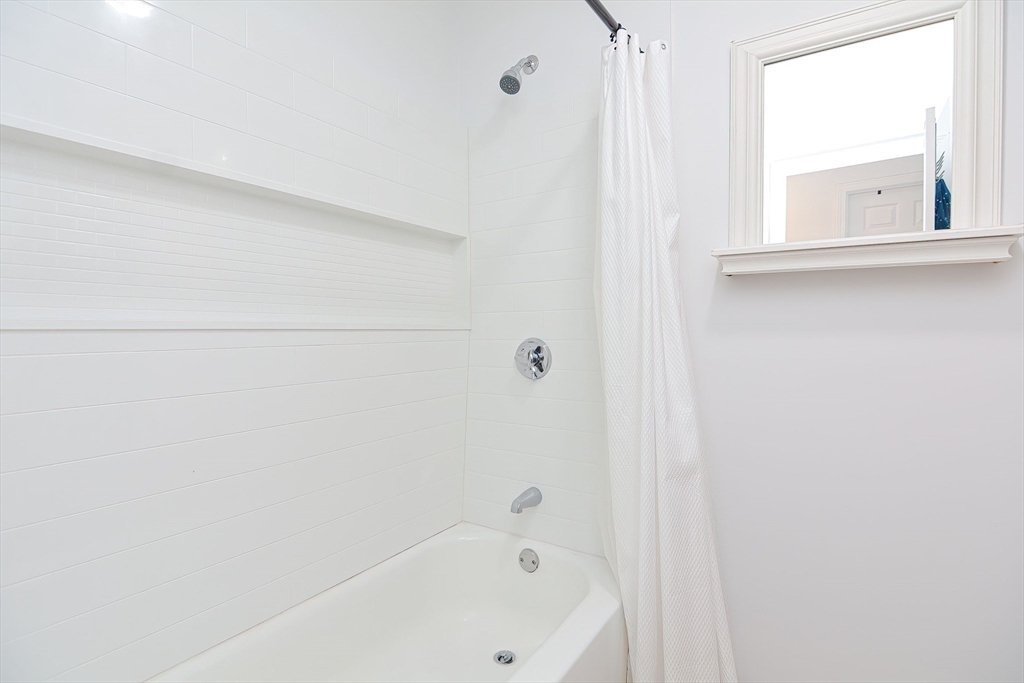257 Brook Circle Hanover, MA 02339 - Photo 19 of 23 a bathroom with a bathtub