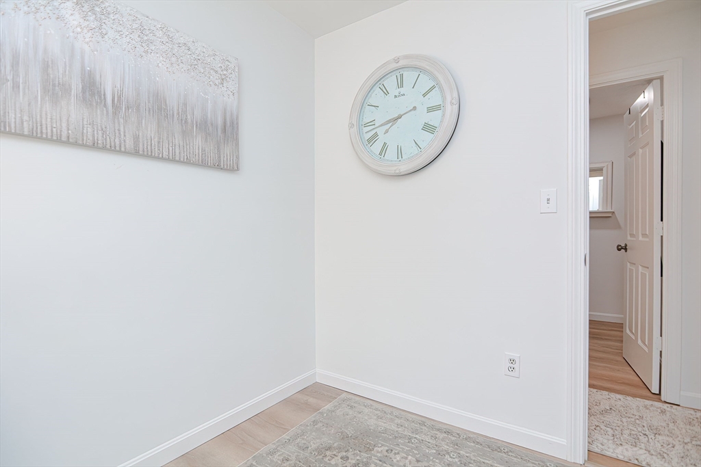 257 Brook Circle Hanover, MA 02339 - Photo 23 of 23 a view of a hallway with elevator