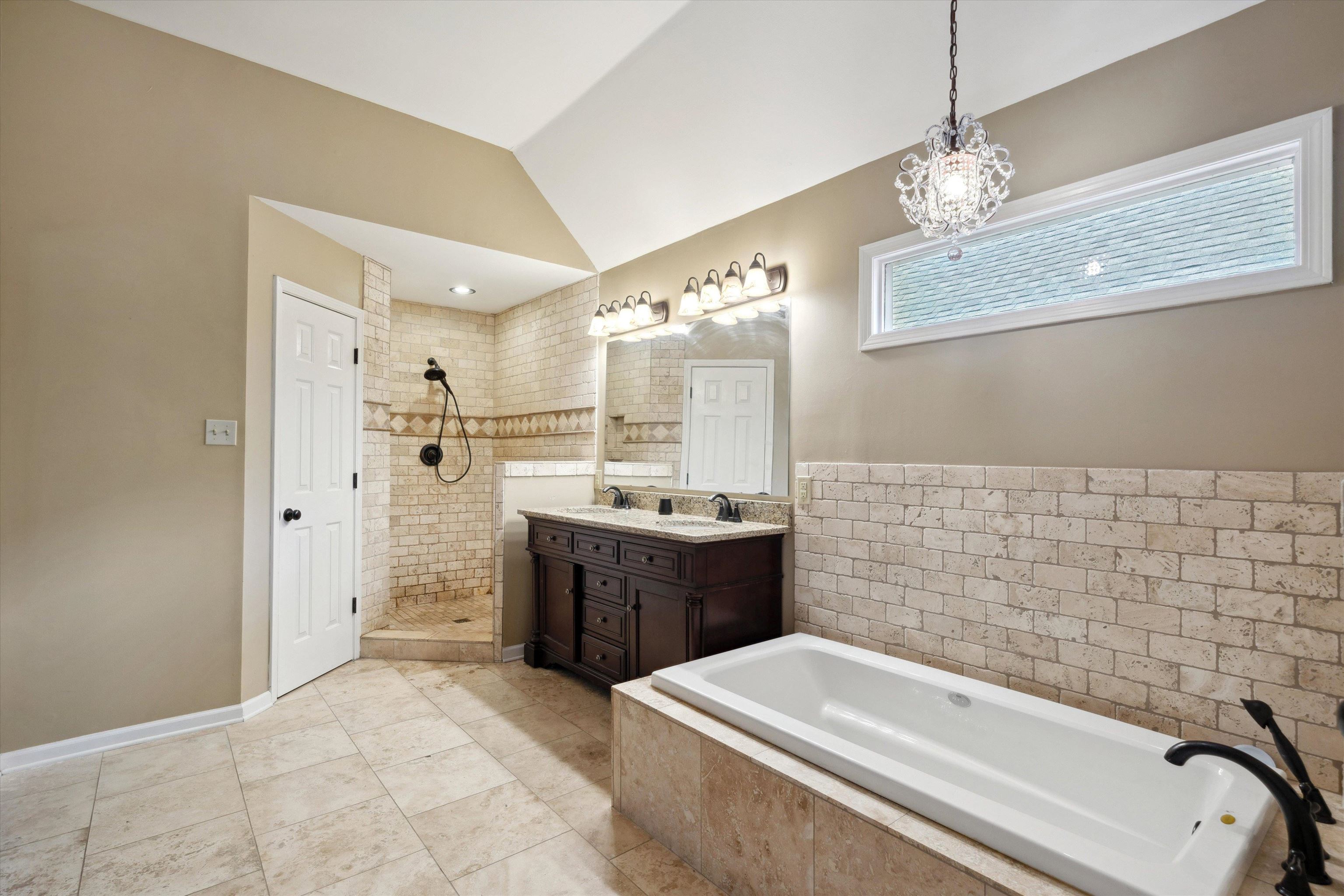 852 Joe Drive Collierville, TN 38017 - Photo 21 of 27 a bathroom with a sink a toilet and shower