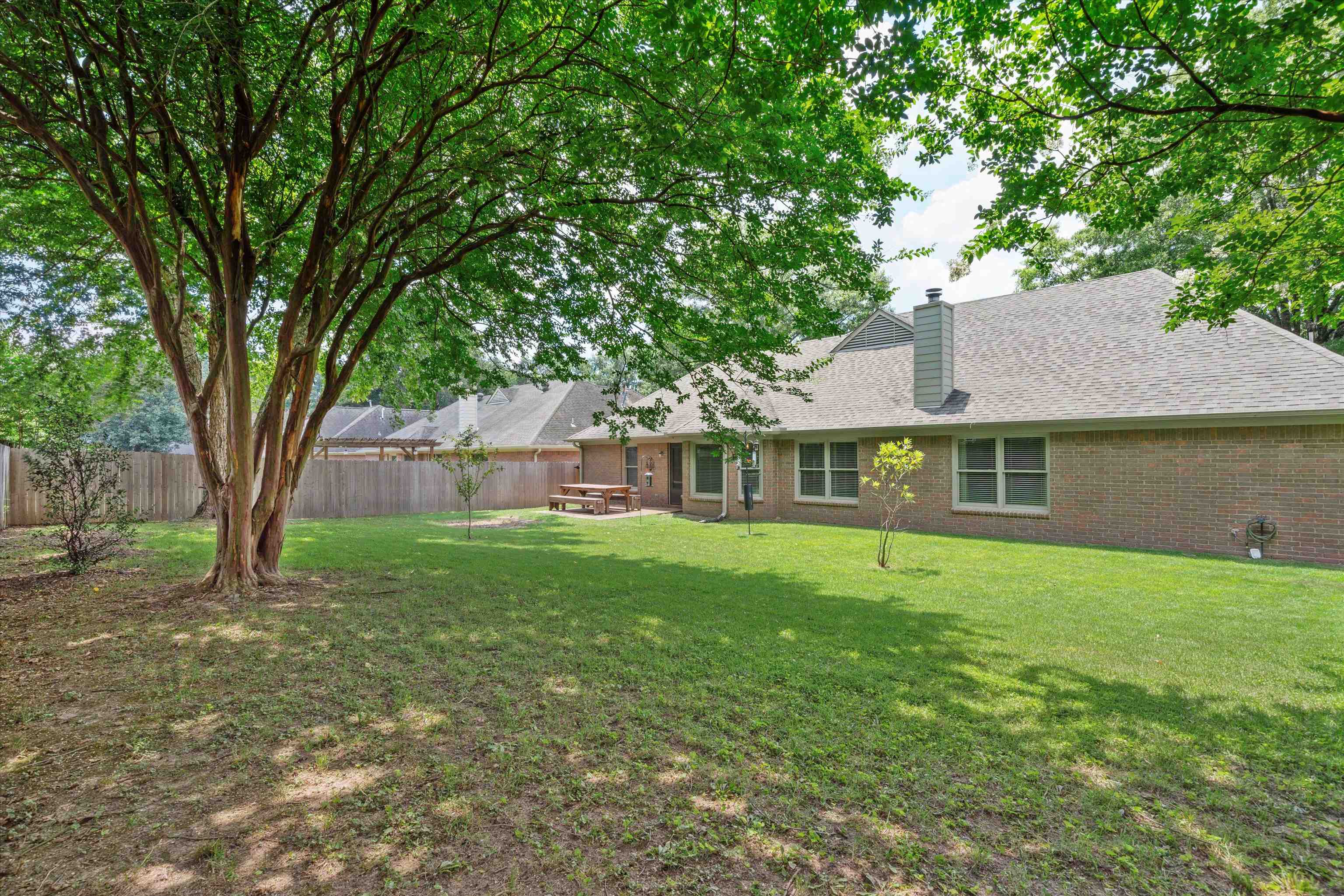 852 Joe Drive Collierville, TN 38017 - Photo 27 of 27 a front view of a house with a garden