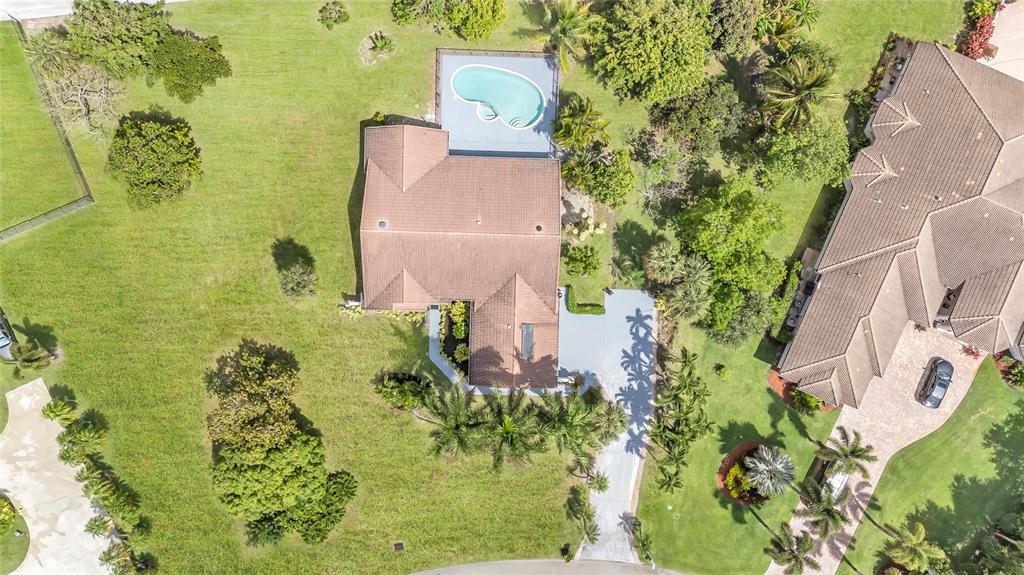 8410 Sawpine Road Delray Beach, FL 33446 - Photo 7 of 37 an aerial view of a house
