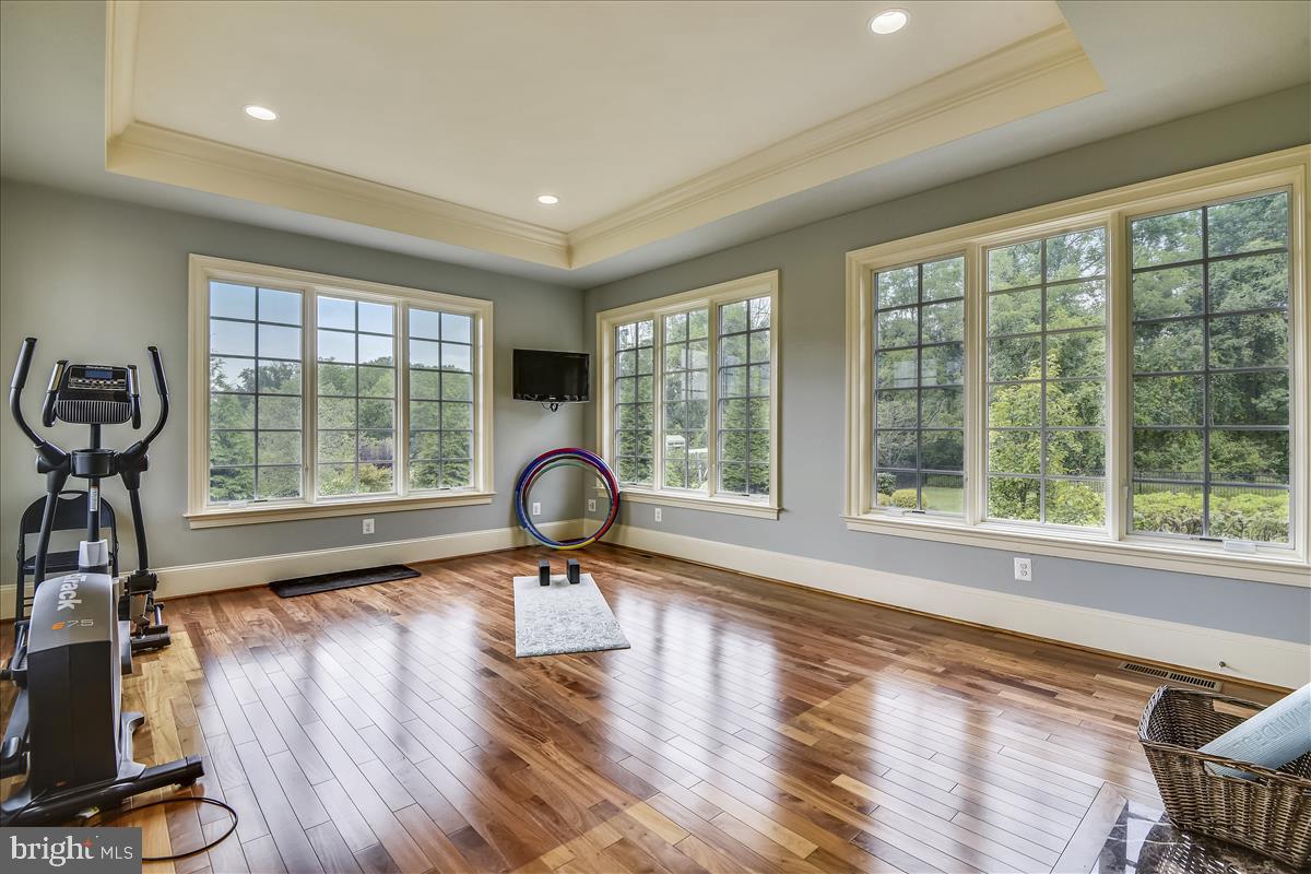 12056 Open Run Road Ellicott City, MD 21042 - Photo 26 of 114 Main floor gym room with hardwoods